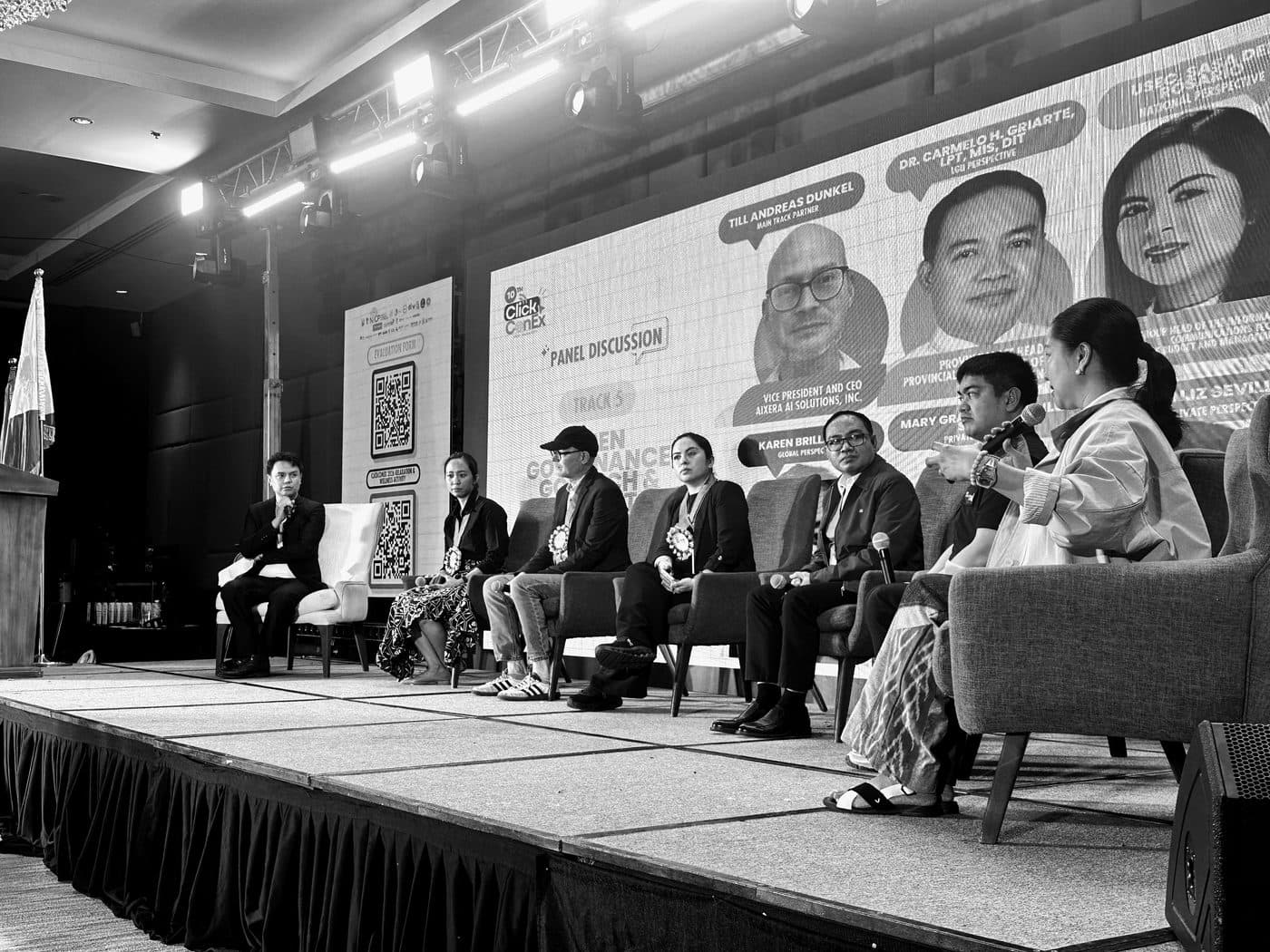 Prof. Voxstra Corbett on stage during a national panel discussion at CLICKCONEX 2026